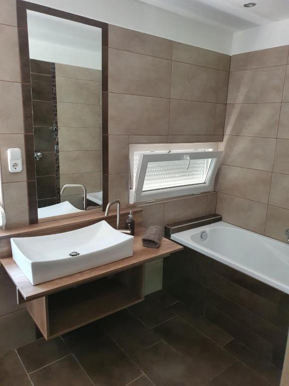 Koupelna v ubytování Happy Home Apartman