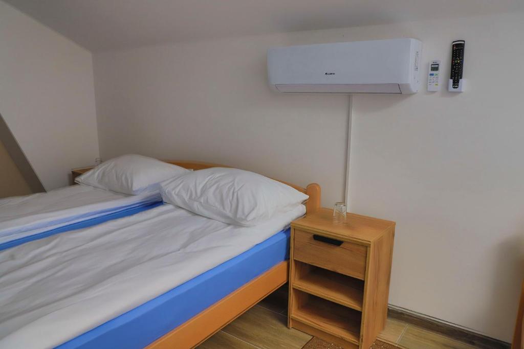 Postel nebo postele na pokoji v ubytování Konak kod Hame