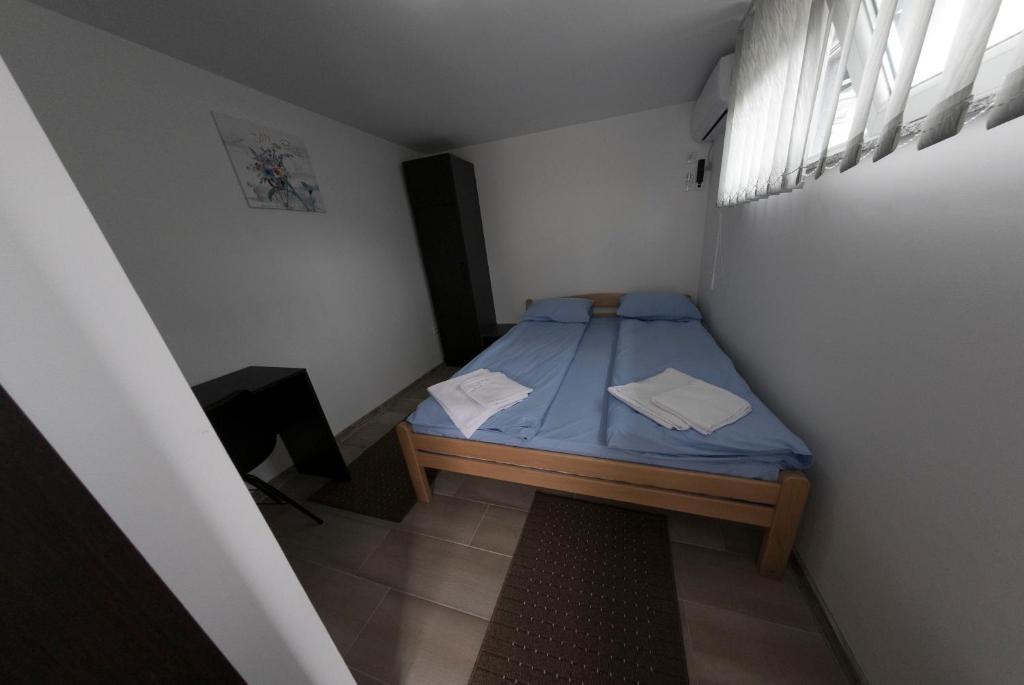 Postel nebo postele na pokoji v ubytování Konak kod Hame