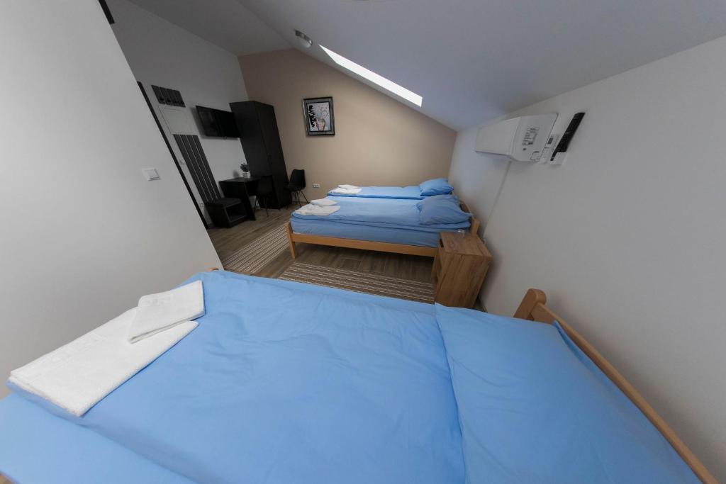 Postel nebo postele na pokoji v ubytování Konak kod Hame