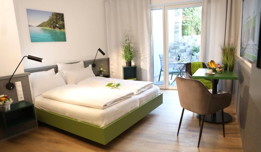 Postel nebo postele na pokoji v ubytování City Appartements Villach