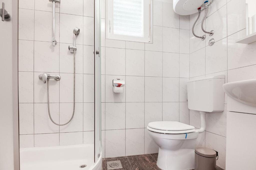 Kúpeľňa v ubytovaní Apartments Tomic
