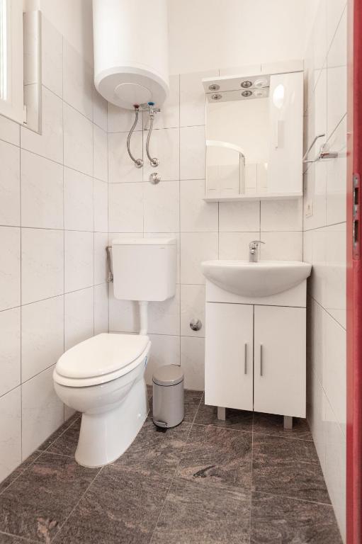 Kúpeľňa v ubytovaní Apartments Tomic