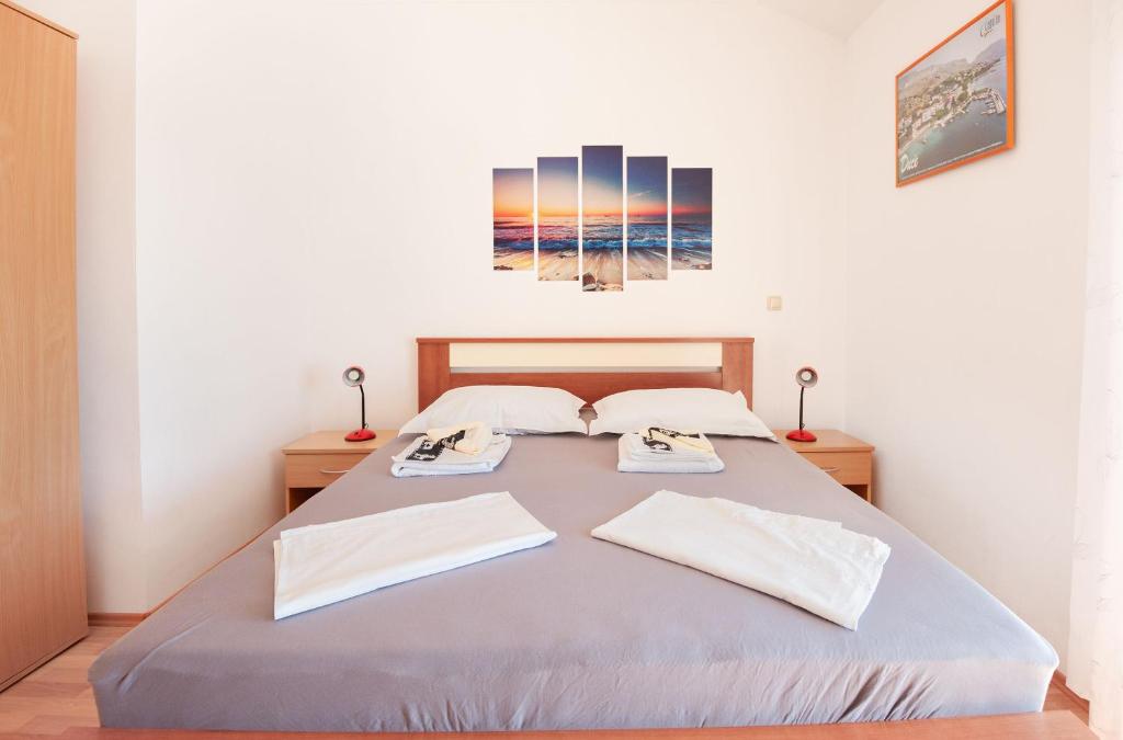 Posteľ alebo postele v izbe v ubytovaní Apartments Tomic