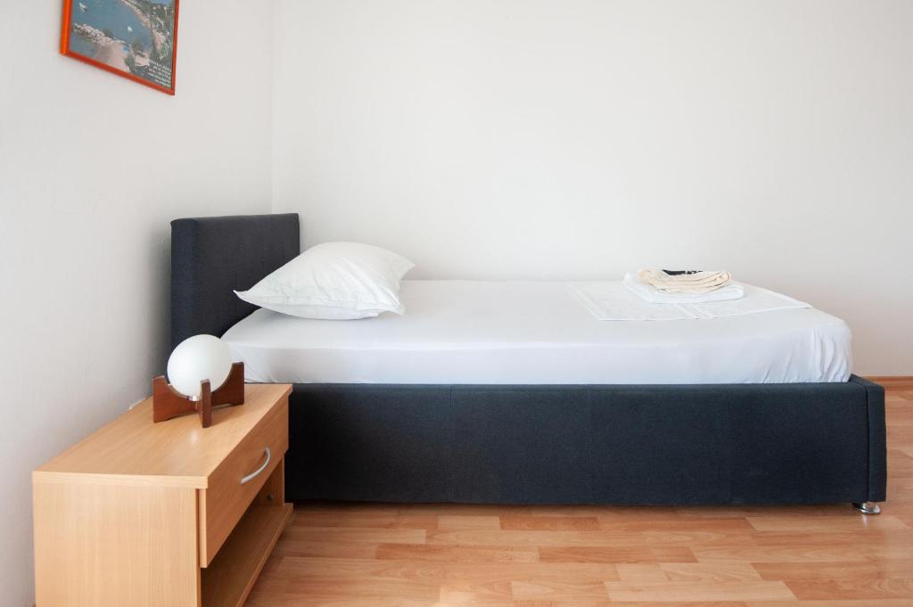 Posteľ alebo postele v izbe v ubytovaní Apartments Tomic