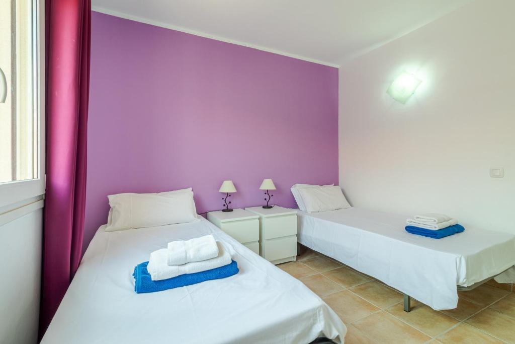 A bed or beds in a room at Flatguest Costa Golf II
