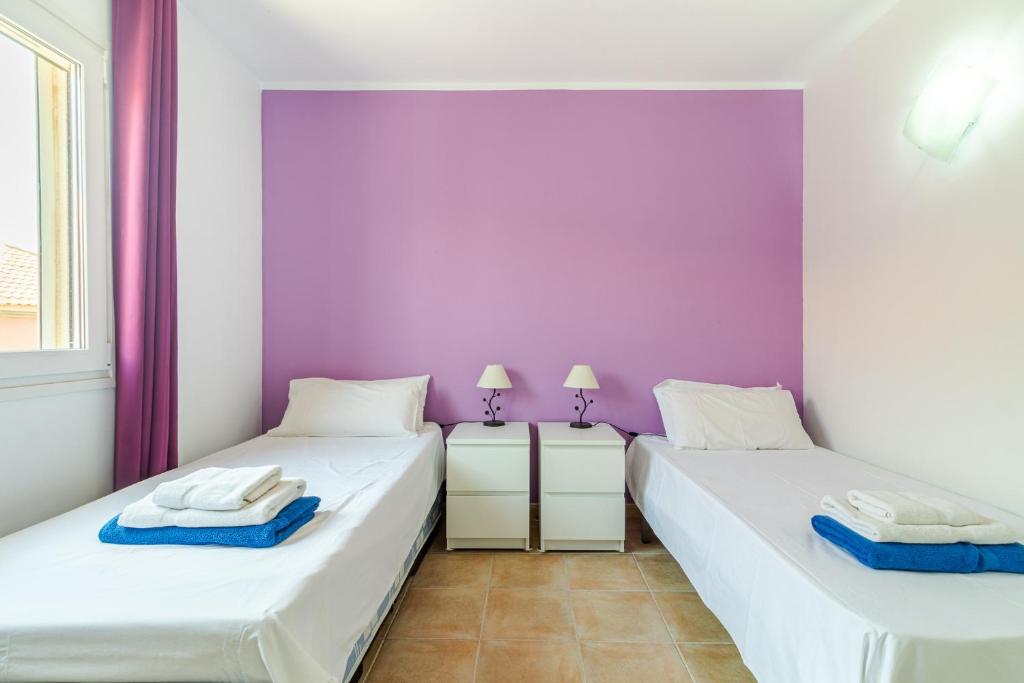 A bed or beds in a room at Flatguest Costa Golf II