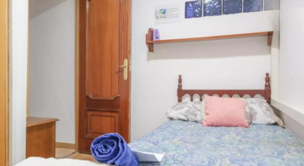 Postel nebo postele na pokoji v ubytování APARTAMENTO MADRID Norte