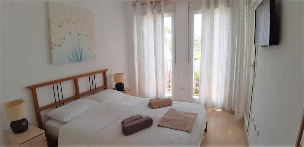 Postel nebo postele na pokoji v ubytování Apartment at Balcones de los Hidalgos 2