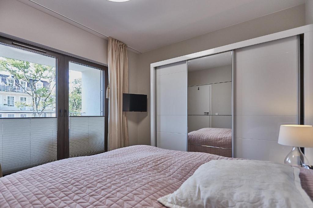 Posteľ alebo postele v izbe v ubytovaní Apartamenty Świnoujście - Kormoran