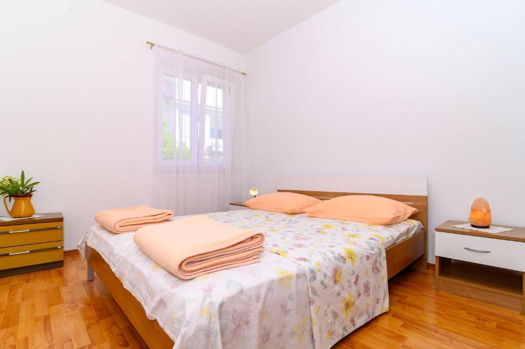Posteľ alebo postele v izbe v ubytovaní Apartments Vice