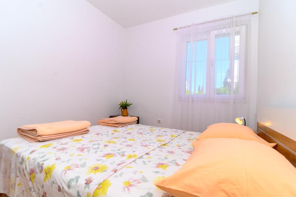 Posteľ alebo postele v izbe v ubytovaní Apartments Vice