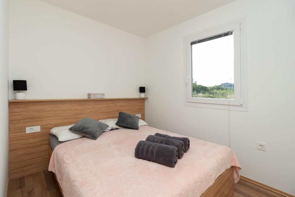 Postel nebo postele na pokoji v ubytování Mobile home Sea Shell