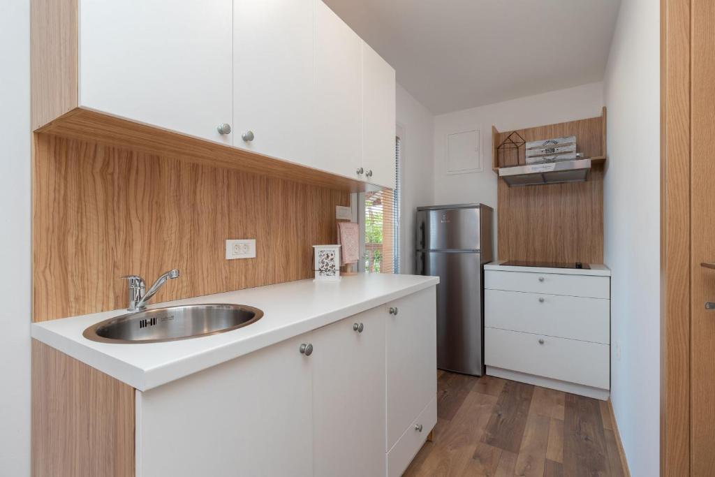 Kuchyň nebo kuchyňský kout v ubytování Mobile home Sea Shell