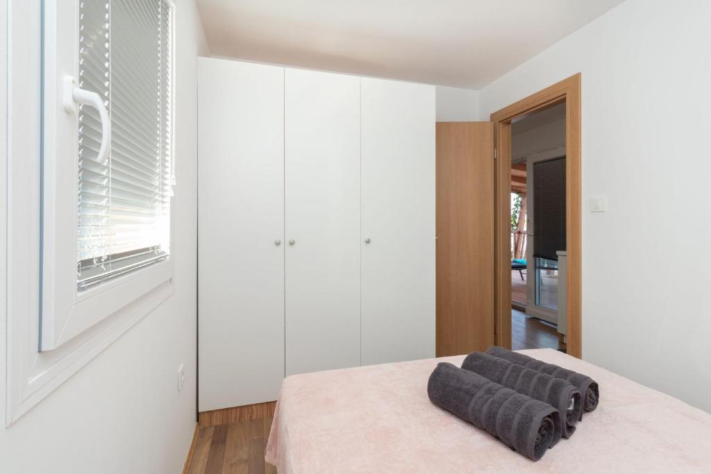 Postel nebo postele na pokoji v ubytování Mobile home Sea Shell