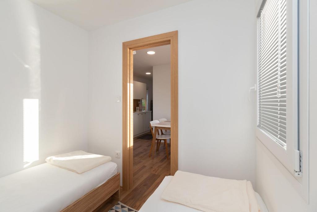Postel nebo postele na pokoji v ubytování Mobile home Sea Shell