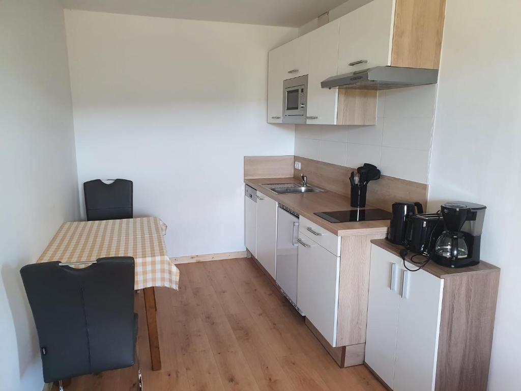 Kuchyň nebo kuchyňský kout v ubytování Apartment Haus Starfach