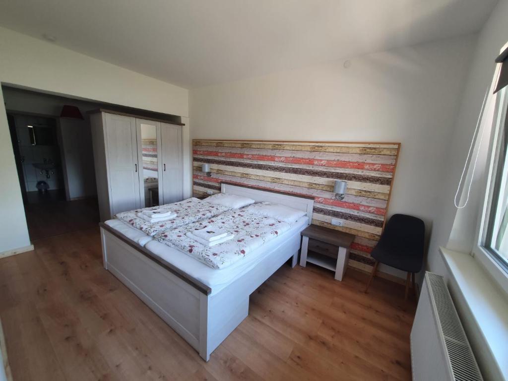 Postel nebo postele na pokoji v ubytování Apartment Haus Starfach