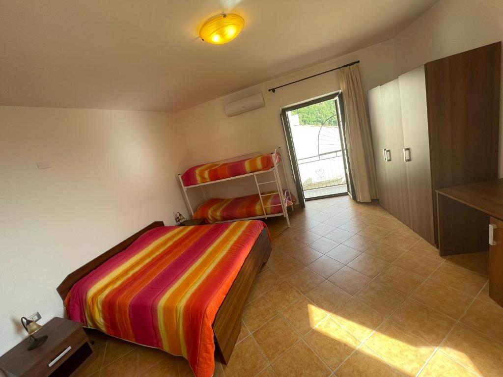 Posteľ alebo postele v izbe v ubytovaní B&B Antica Locanda San Ciriaco
