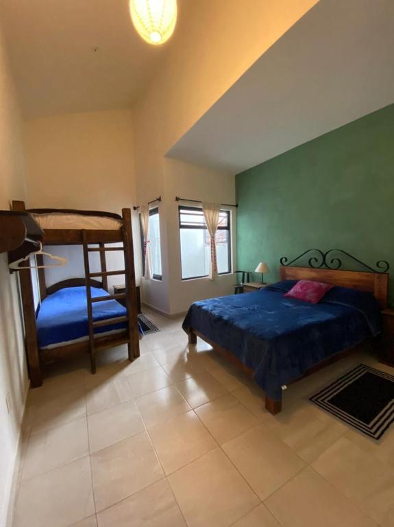 Postel nebo postele na pokoji v ubytování Casa Tequio