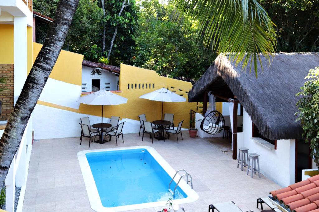 Bazén v ubytování Pousada Arraial Colonial, Localizada no Centrinho e de Fácil Acesso a Praia e a Rua Mucugê nebo v jeho okolí