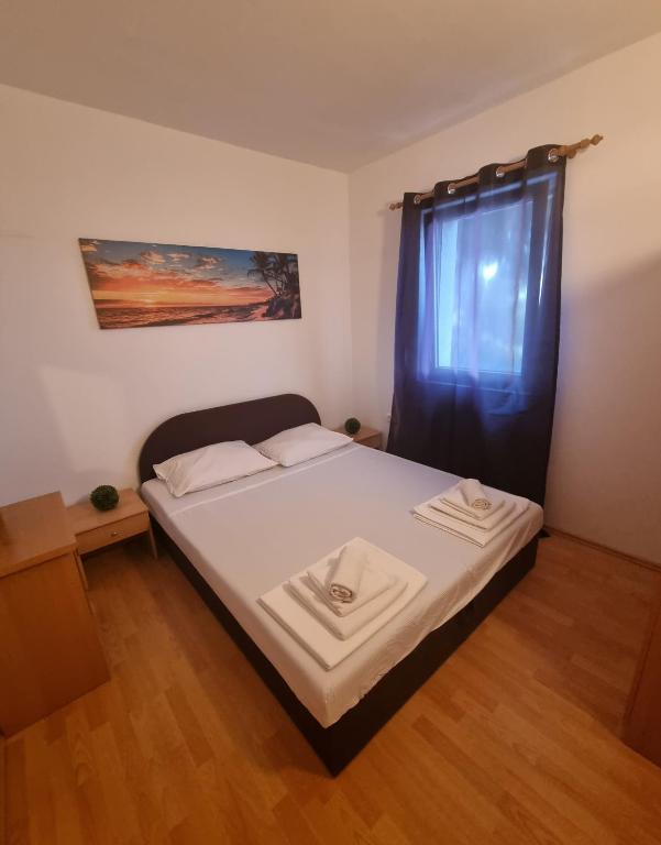 Posteľ alebo postele v izbe v ubytovaní Euromodus apartmani