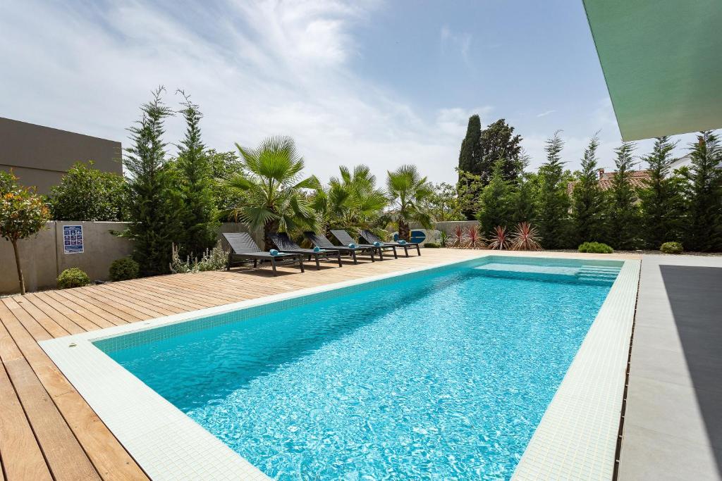 Bazén v ubytovaní luxury Villa One Way alebo v jeho blízkosti