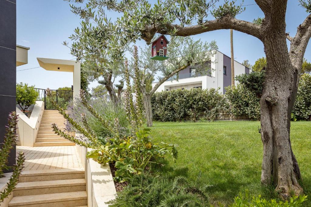 Vonkajšia záhrada v ubytovaní luxury Villa One Way