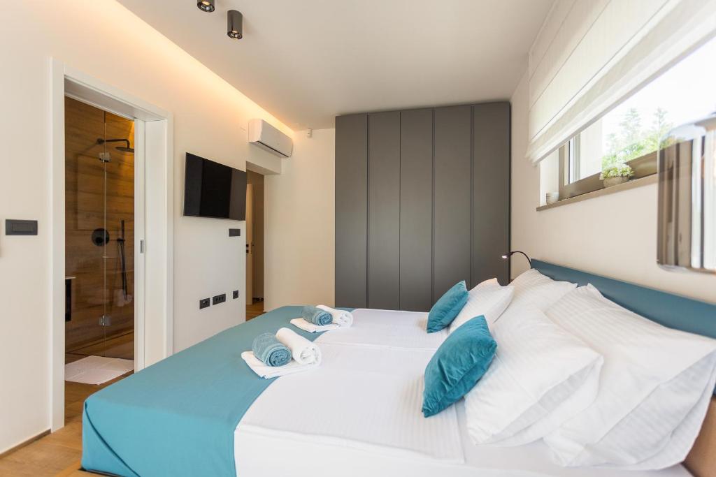 Posteľ alebo postele v izbe v ubytovaní luxury Villa One Way
