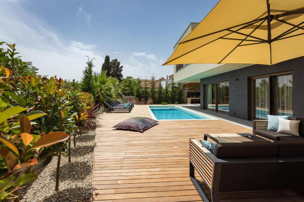 Bazén v ubytovaní luxury Villa One Way alebo v jeho blízkosti