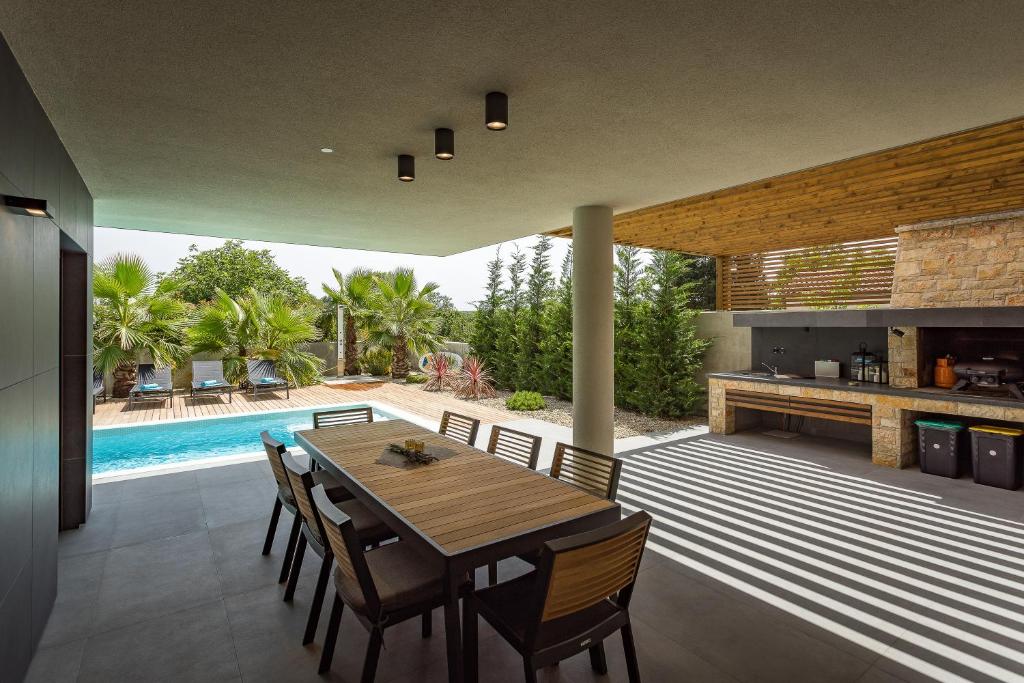 Bazén v ubytovaní luxury Villa One Way alebo v jeho blízkosti