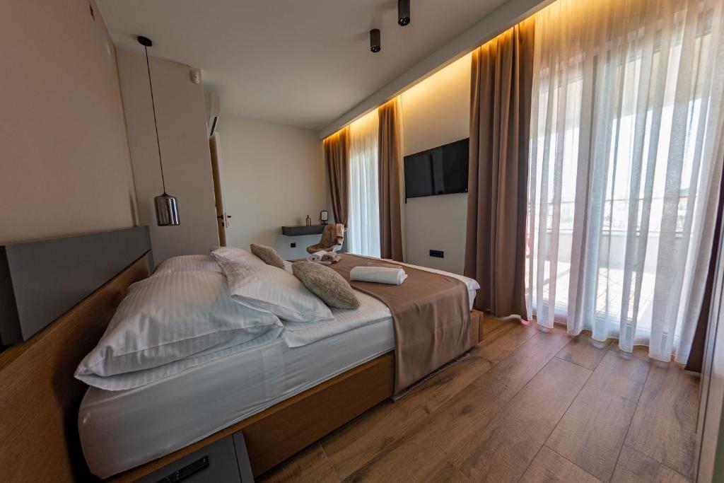 Posteľ alebo postele v izbe v ubytovaní luxury Villa One Way