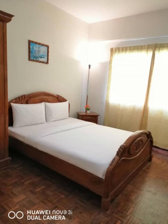 Postel nebo postele na pokoji v ubytování PD Lagoon Resort