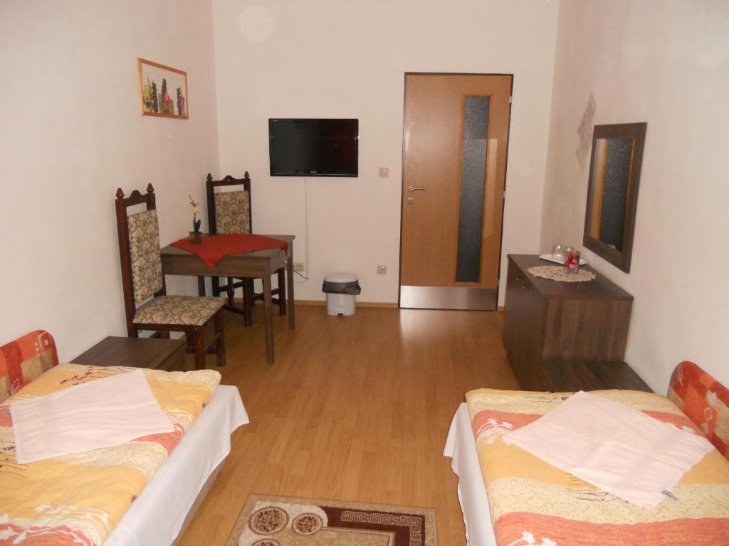 Postel nebo postele na pokoji v ubytování Motel Madona