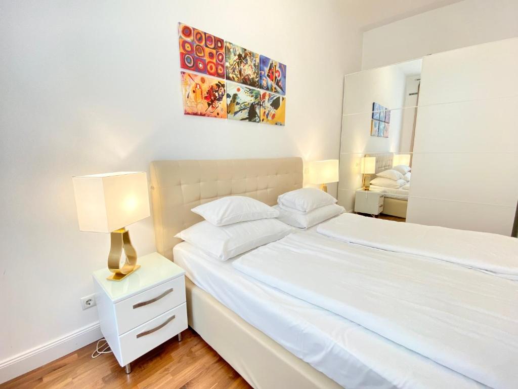 Posteľ alebo postele v izbe v ubytovaní Steiner Residences Vienna Taborstrasse