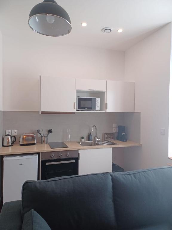 Kuchyň nebo kuchyňský kout v ubytování Mazamet - Studio neuf et moderne en centre-ville