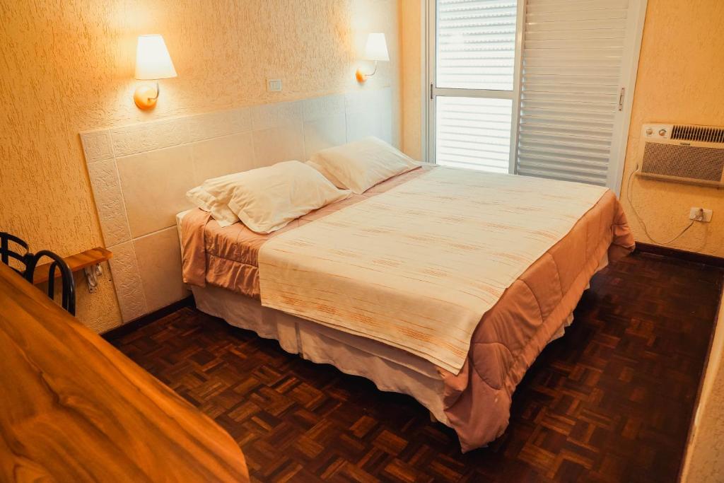 Postel nebo postele na pokoji v ubytování Pousada do Anhangava