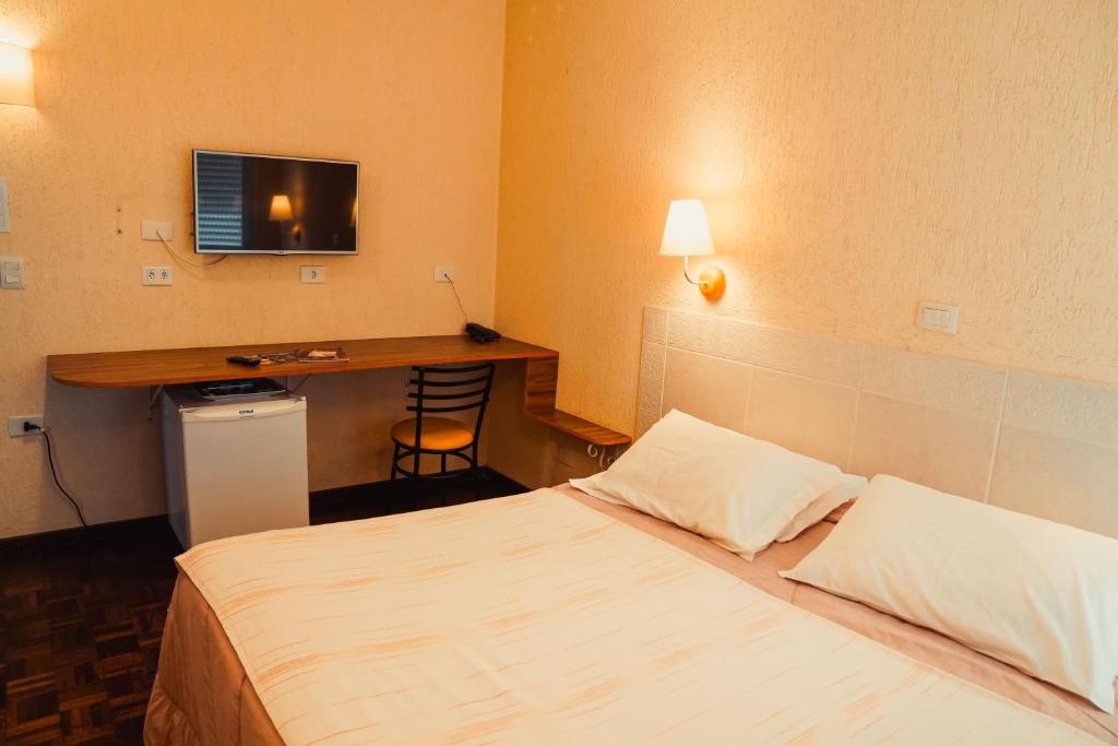 Postel nebo postele na pokoji v ubytování Pousada do Anhangava