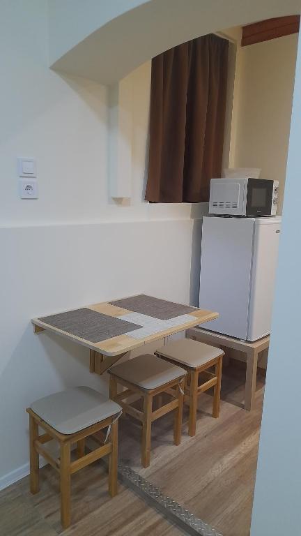 Kuchyňa alebo kuchynka v ubytovaní Magnolia apartman