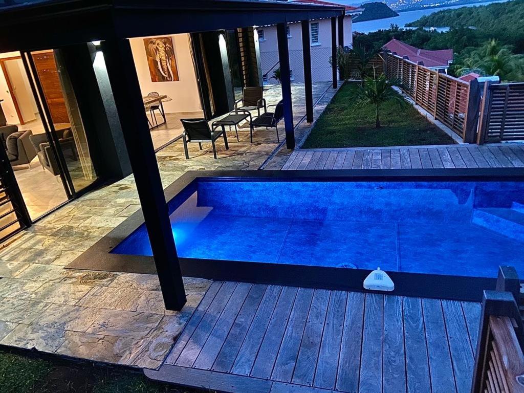 Kolam renang di atau di dekat Villa Passion Cannelle de standing avec sa piscine vue mer