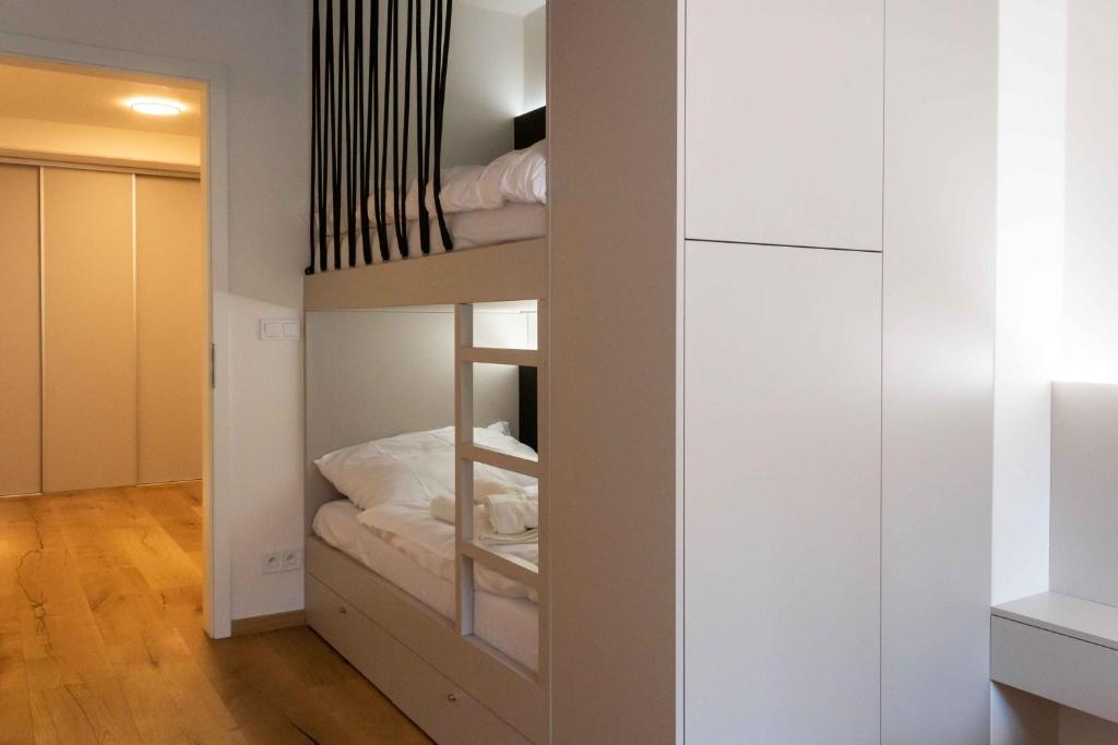 Postel nebo postele na pokoji v ubytování Wellness Apartmán Pila Kvilda