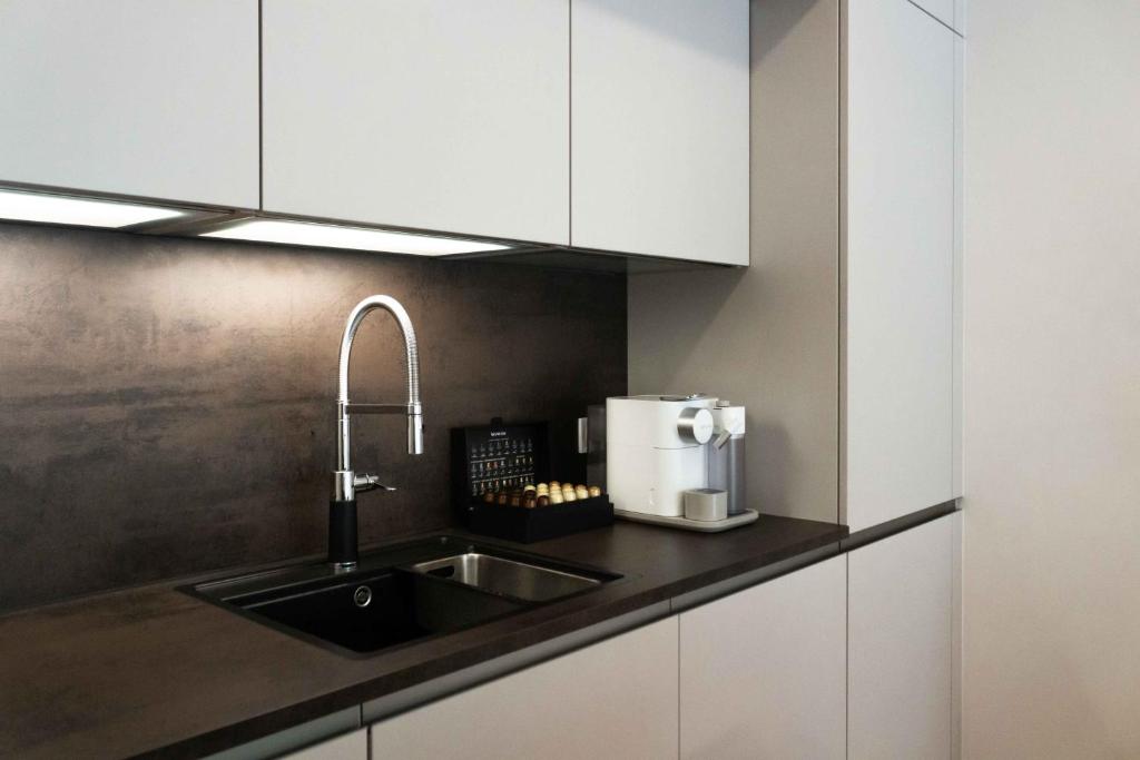 Kuchyň nebo kuchyňský kout v ubytování Wellness Apartmán Pila Kvilda
