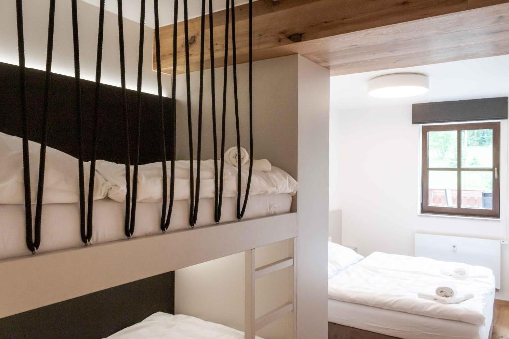 Postel nebo postele na pokoji v ubytování Wellness Apartmán Pila Kvilda