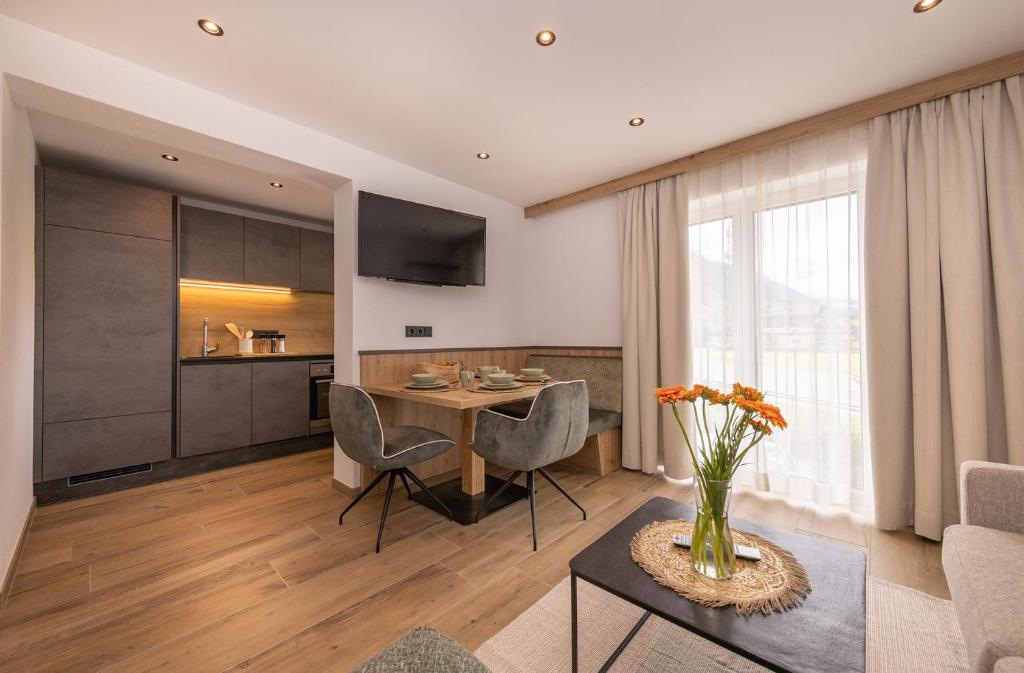 TV a/nebo společenská místnost v ubytování Lenni´s Apartments