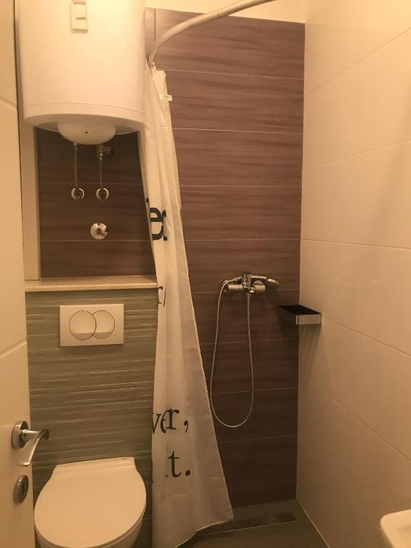Koupelna v ubytování Apartments Nela