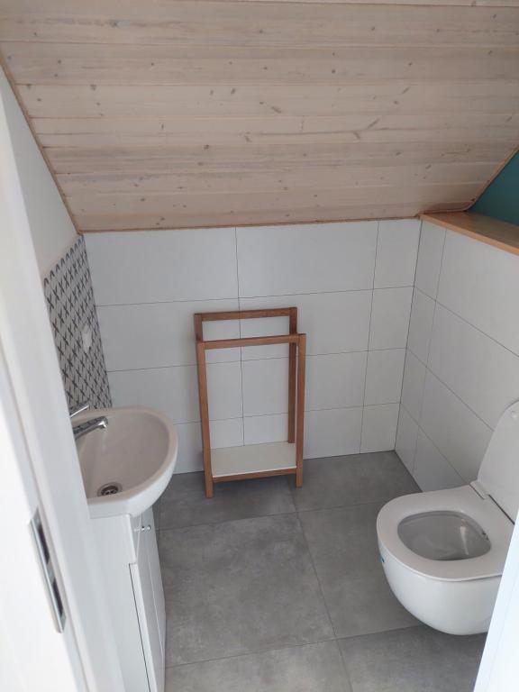 Kúpeľňa v ubytovaní Jantarovnia