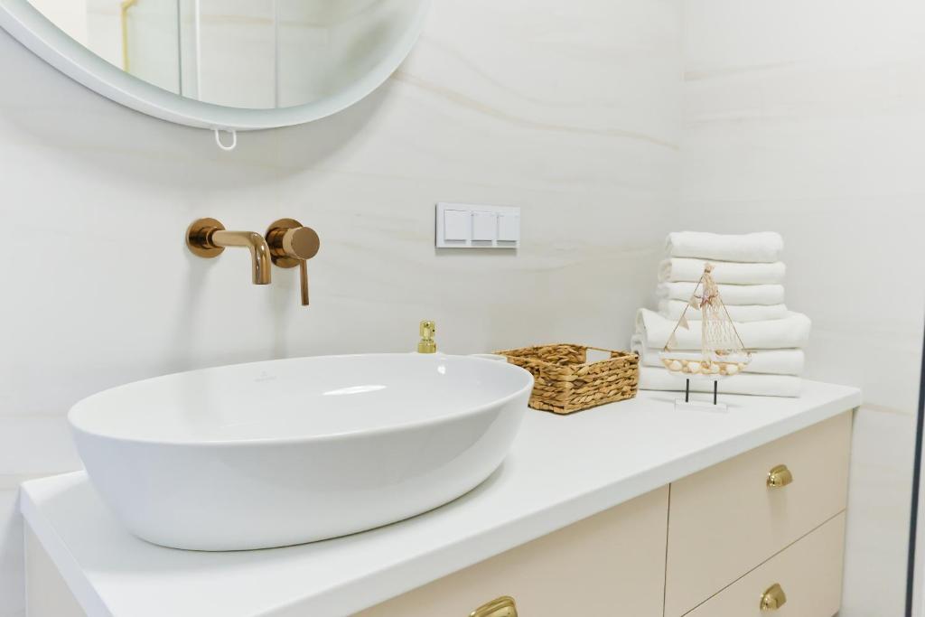 Kúpeľňa v ubytovaní M&K Apartamenty Sailors Golden Yacht, Gdańsk - Wyspa Sobieszewska