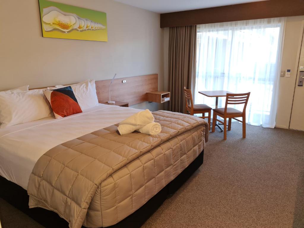 Postel nebo postele na pokoji v ubytování Kingsgate Hotel Autolodge Paihia