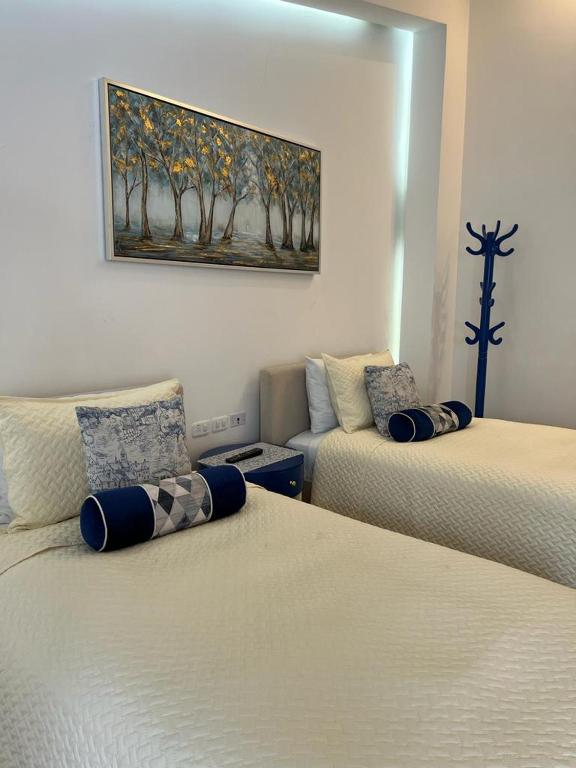 Postel nebo postele na pokoji v ubytování Adamas House Hotel Boutique