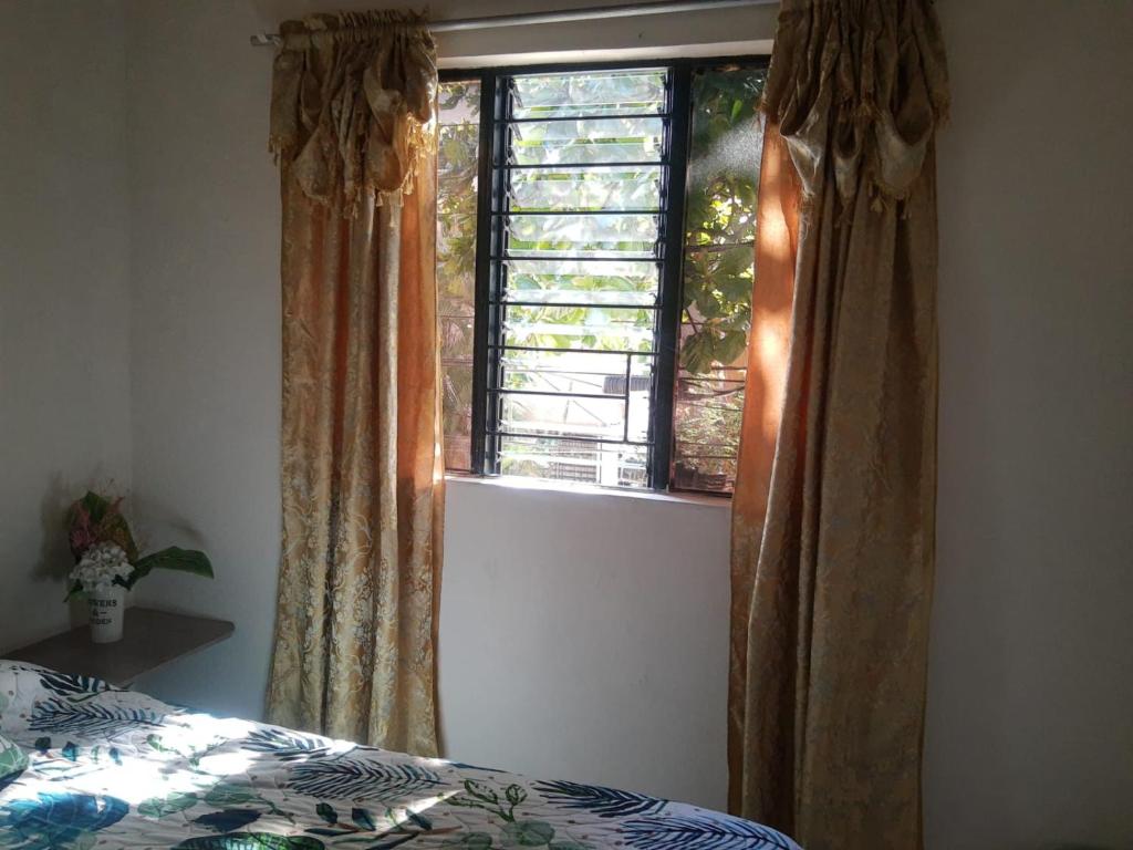 Postel nebo postele na pokoji v ubytování Pa Pasiar Hostal